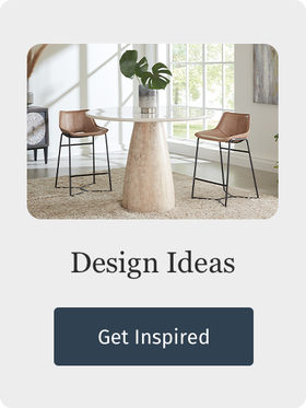 Dining room with a round table and chairs, featuring the text 'Design Ideas Get Inspired'.