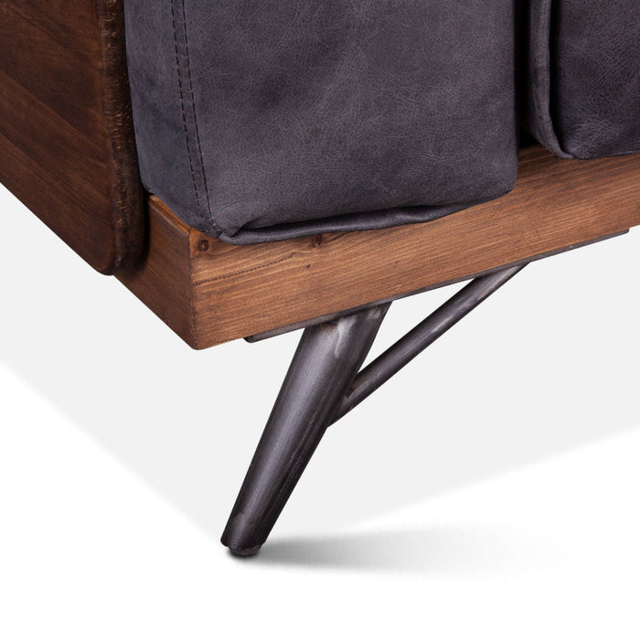 Chiavari Mid-Century Antique Ebony Leather Armchair — World Interiors